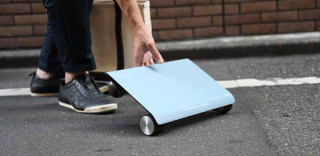 踩着电脑在地上飞?能塞进包包的WalkCar代步机